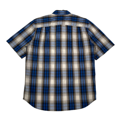 Back view of a Digg It Thrift & Vintage Carhartt short sleeve work shirt in royal blue and tan plaid pattern