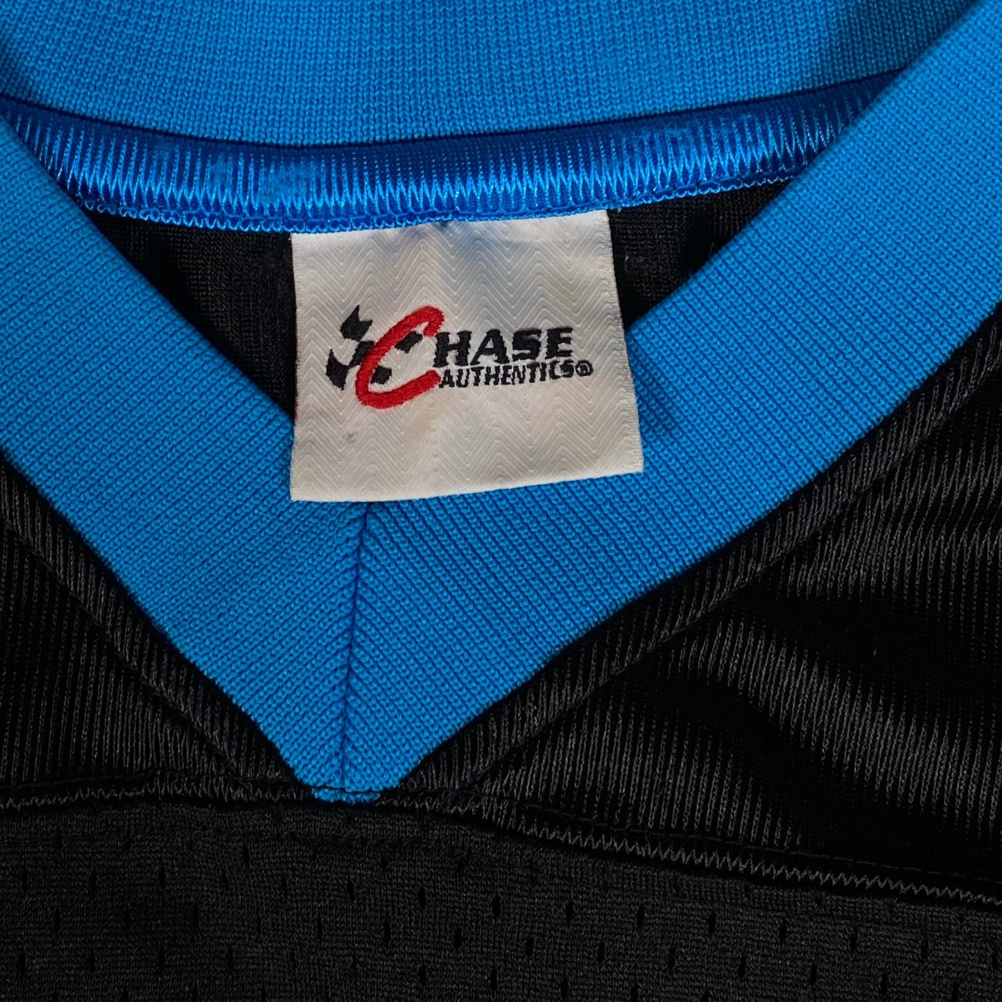 Digg It Thrift & Vintage Chase Authentics Ryan Newman NASCAR mesh jersey with blue and black V-neck collar