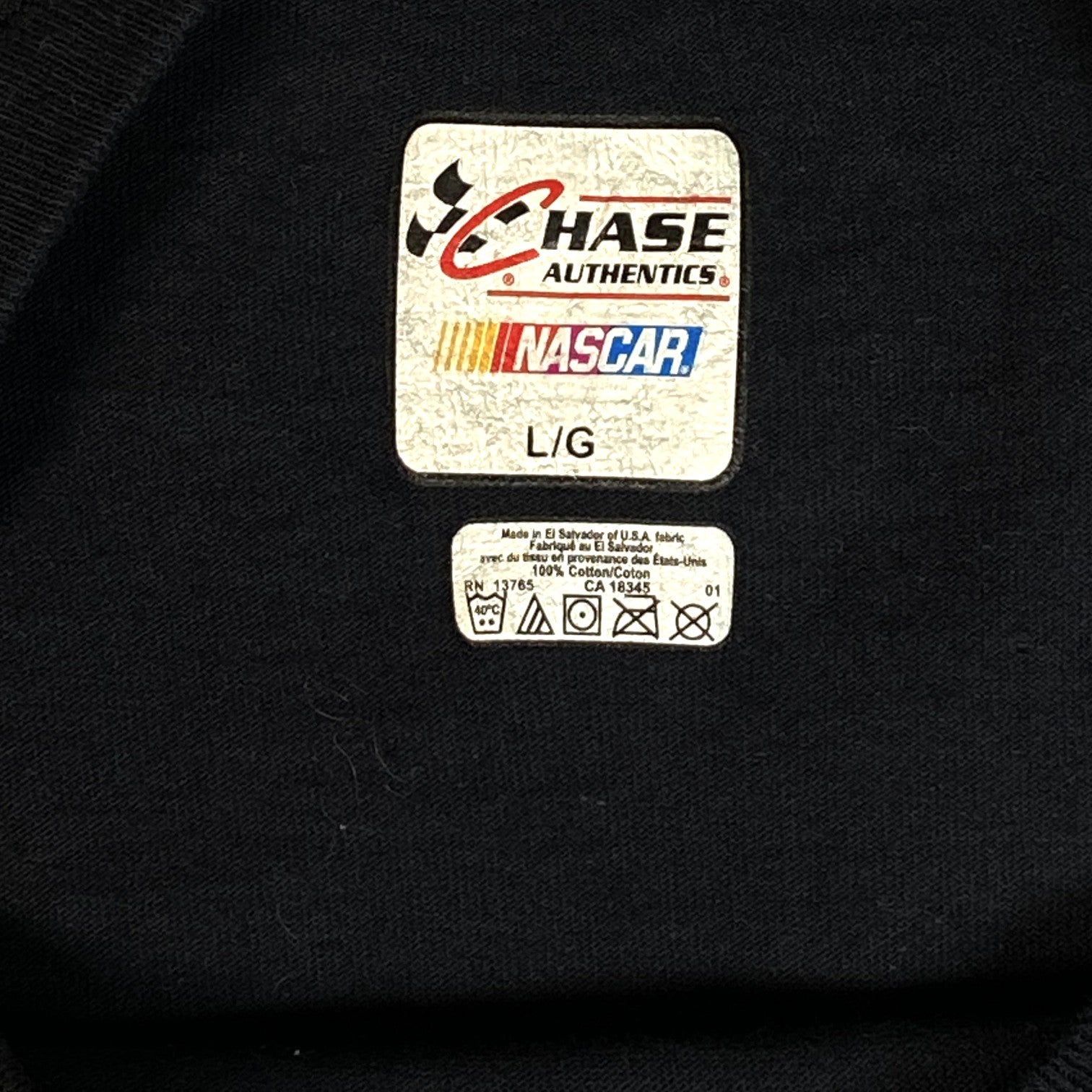 Digg It Thrift & Vintage Chase Authentics NASCAR t-shirt label showing size large and 100 percent cotton material