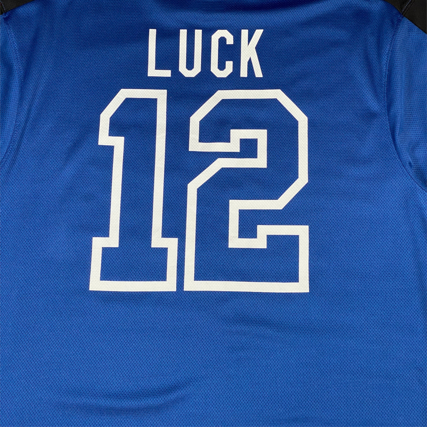 Digg It Thrift & Vintage blue Indianapolis Colts Andrew Luck jersey with white number 12 and name on back