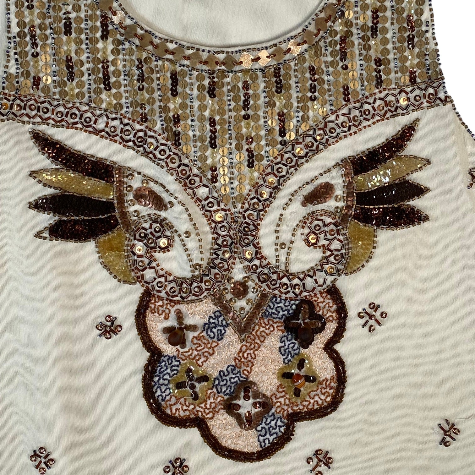 Digg It Thrift & Vintage cream mesh tank top featuring intricate gold and brown sequin and bead owl embroidery.