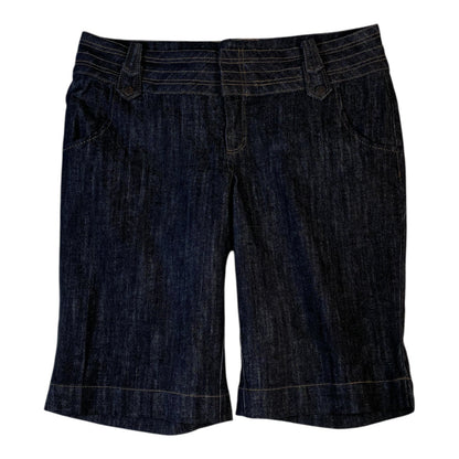 Digg It Thrift & Vintage dark wash denim shorts with a mid-rise waist and stitched waistband detail.
