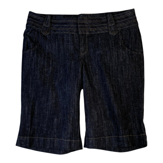 Digg It Thrift & Vintage dark wash denim shorts with a mid-rise waist and stitched waistband detail.