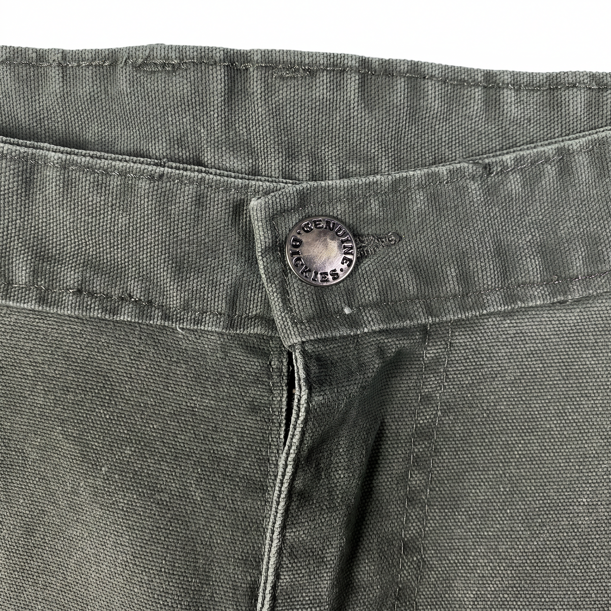 Digg It Thrift & Vintage Dickies dark green work pants featuring a branded metal button and durable canvas fabric.
