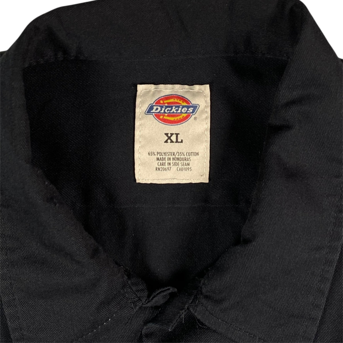 Digg It Thrift & Vintage Dickies solid black long sleeve work shirt with XL size tag and polyester cotton blend label