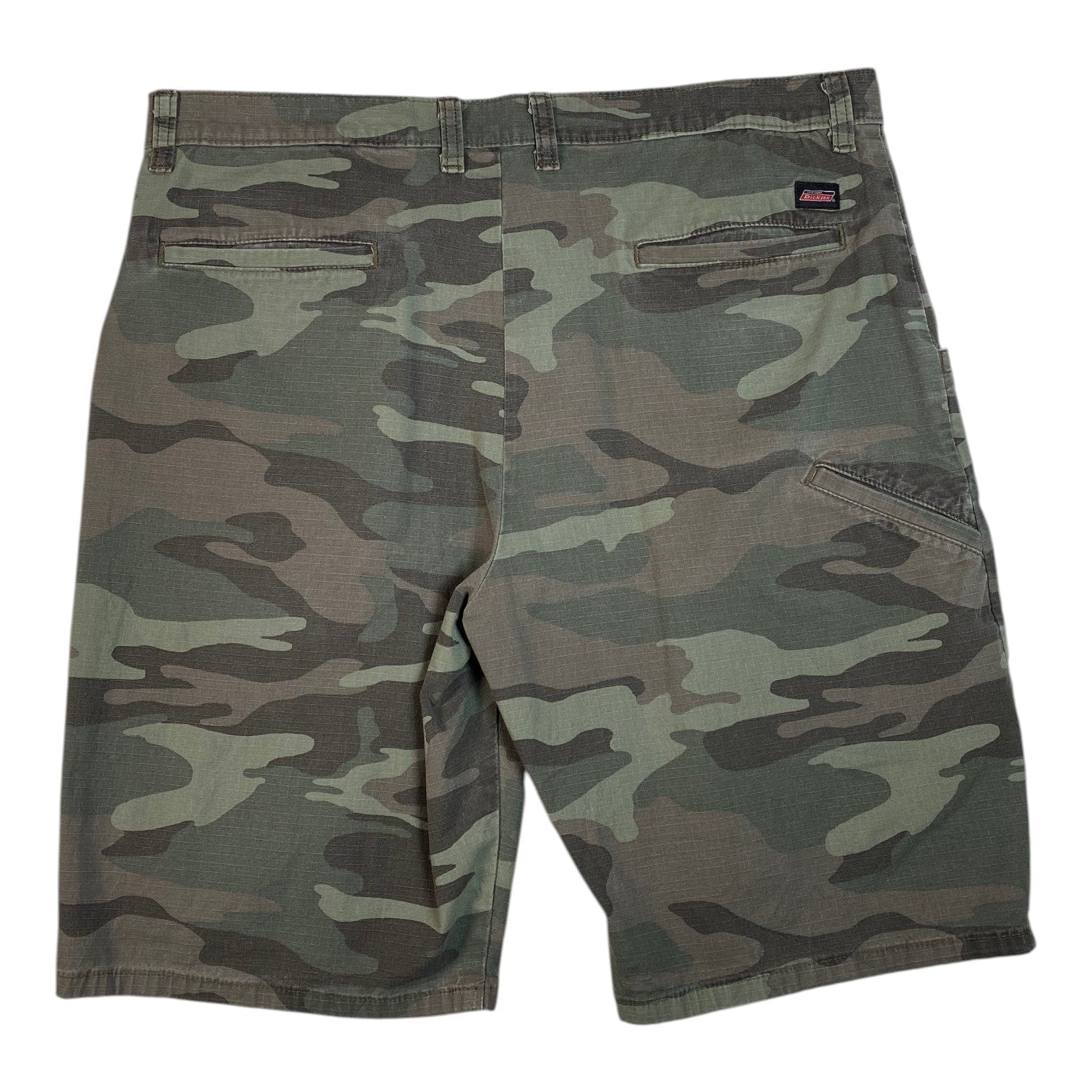 Digg It Thrift & Vintage Dickies woodland camo shorts featuring a classic utility design and back pocket logo tag.