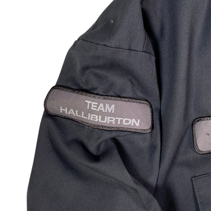 Digg It Thrift & Vintage gray Dickies work shirt featuring a Team Halliburton patch on the sleeve