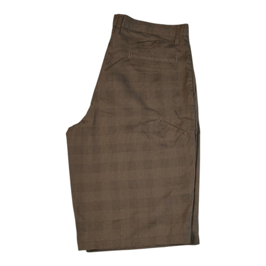 Digg It Thrift & Vintage Dickies khaki longline shorts featuring a subtle shadow plaid pattern and back pockets.