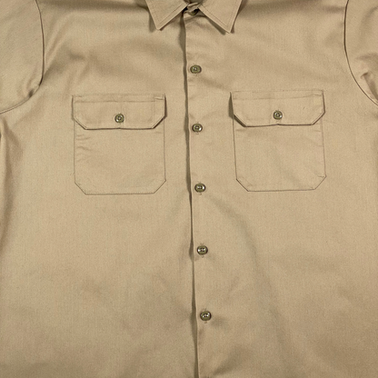 Digg It Thrift & Vintage Dickies desert sand khaki short sleeve work shirt with two chest pockets and button front.