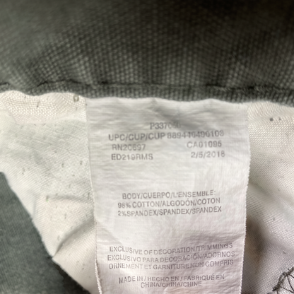 Digg It Thrift & Vintage Dickies dark green pants fabric care label showing cotton and spandex material composition