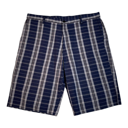 Digg It Thrift & Vintage Dickies navy and grey plaid longline shorts with a button closure and side pockets.