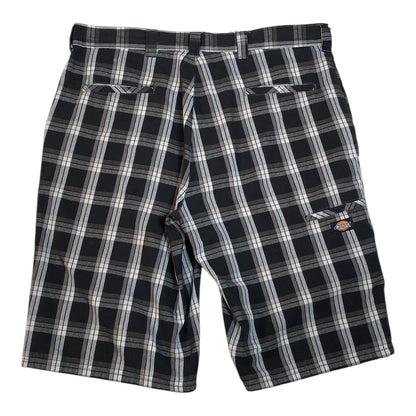 Digg It Thrift & Vintage Dickies black and white plaid shorts with back pockets and logo patch