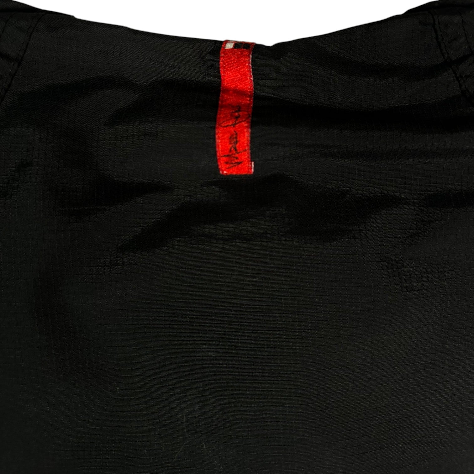 Digg It Thrift & Vintage black Ecko Unltd. winter jacket featuring a red branded neck label detail