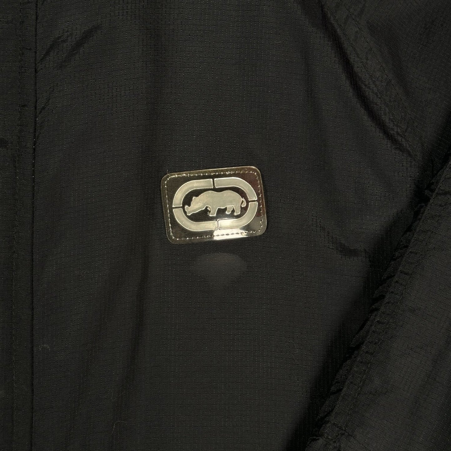 Digg It Thrift & Vintage black Ecko Unltd. winter jacket with a silver rhino logo patch and fleece lining