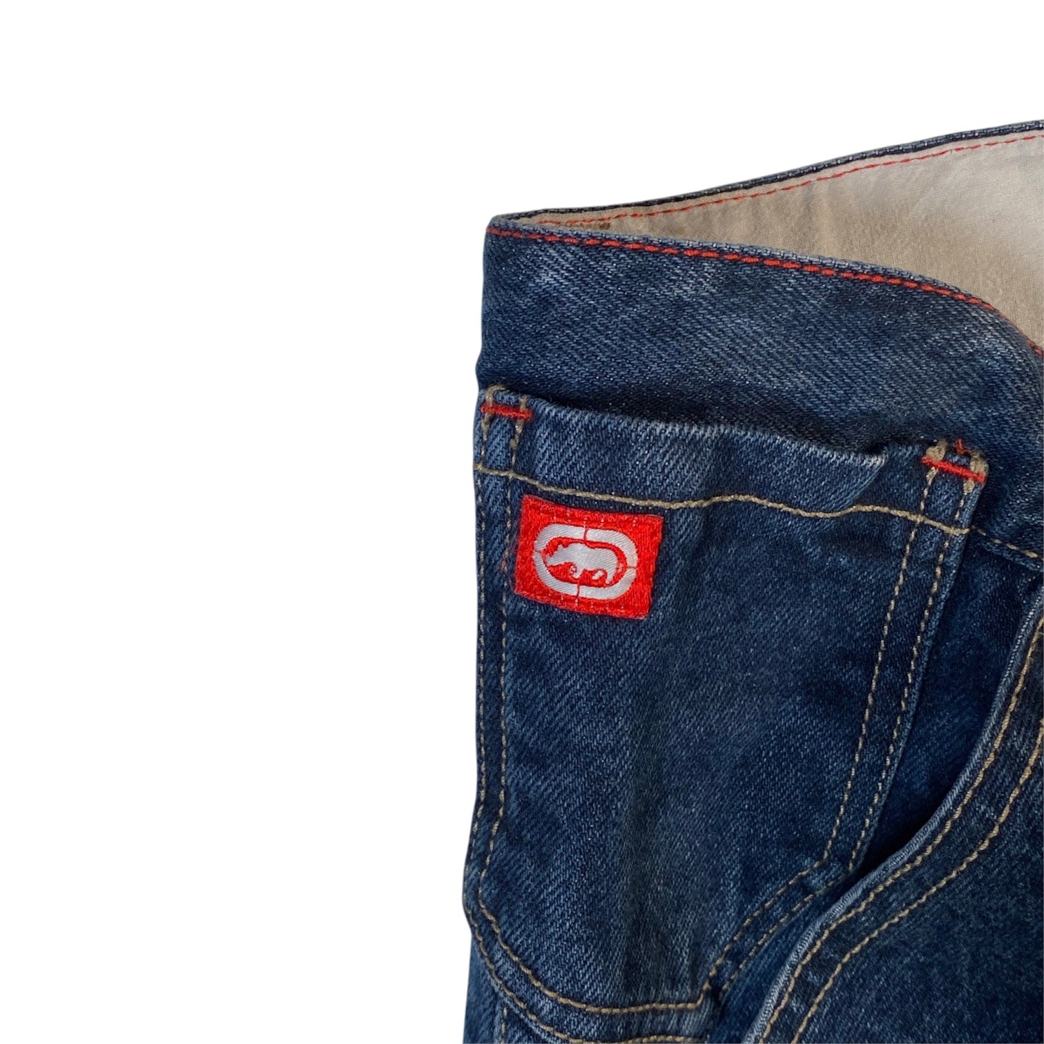 Digg It Thrift & Vintage Ecko Unltd. baggy denim jorts featuring a red logo patch and contrast stitching