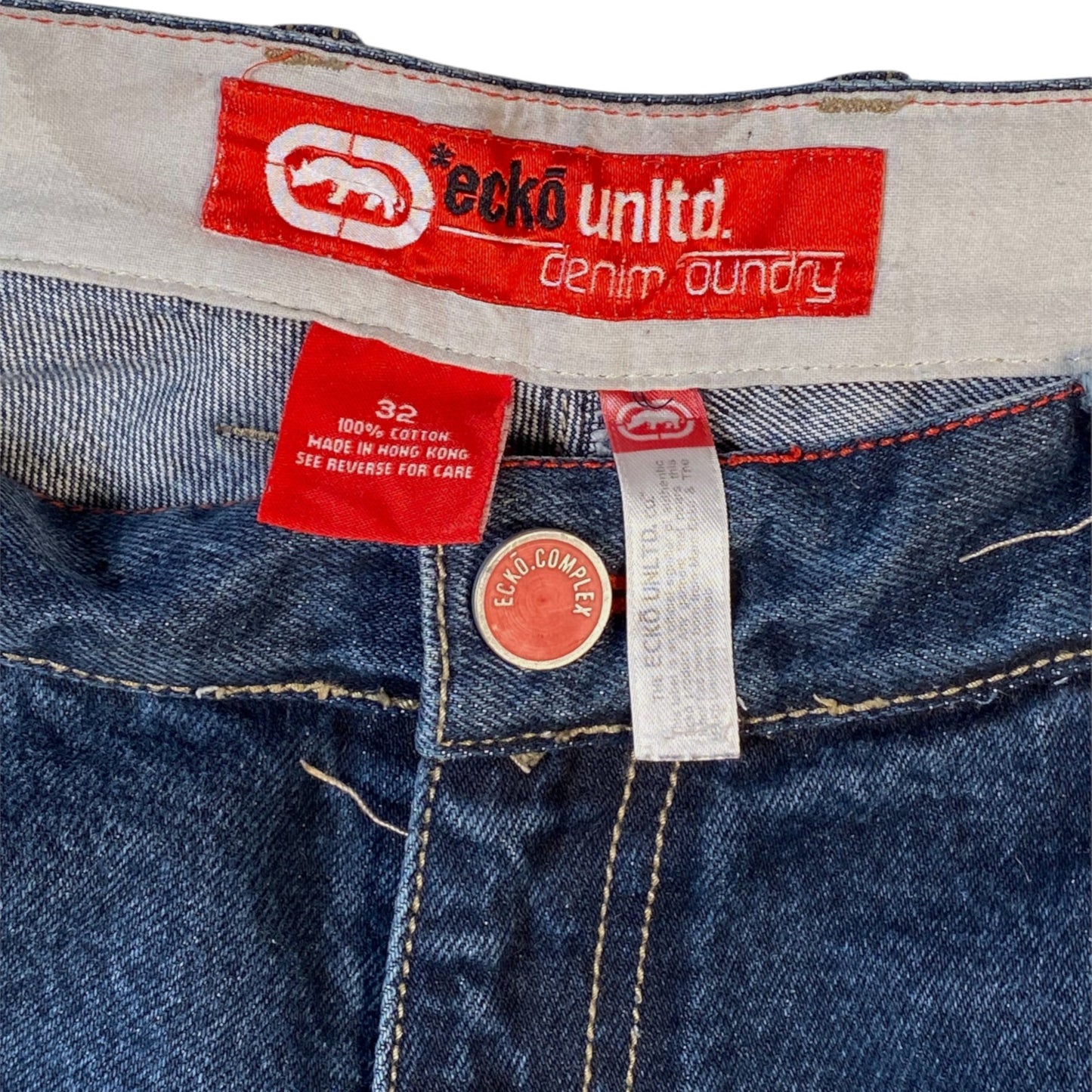 Digg It Thrift & Vintage Ecko Unltd. baggy denim jorts with red brand label and size 32 tag