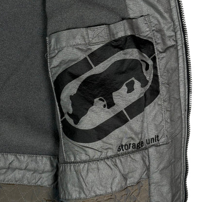 Digg It Thrift & Vintage black Ecko Unltd. winter jacket interior featuring a fleece lining and storage unit pocket