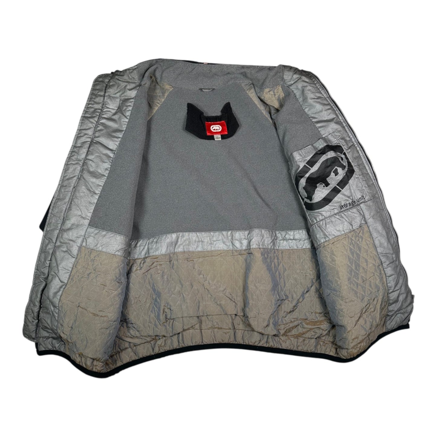 Interior view of a Digg It Thrift & Vintage Ecko Unltd. black winter jacket with grey fleece lining and branding.