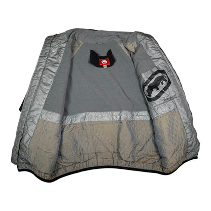 Interior view of a Digg It Thrift & Vintage Ecko Unltd. black winter jacket with grey fleece lining and branding.