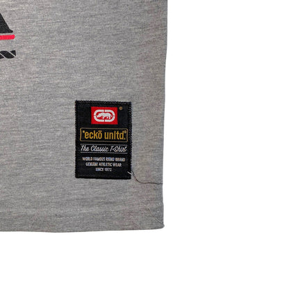 Digg It Thrift & Vintage Ecko Unltd. grey graphic t-shirt with a black and red brand patch on the hem