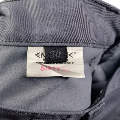 Digg It Thrift & Vintage Energie B-Boy denim jorts interior tag showing size 30 and Sixty S.P.A branding