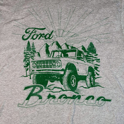 Digg It Thrift & Vintage heather grey Ford Bronco t-shirt with green graphic print of an off-road vehicle