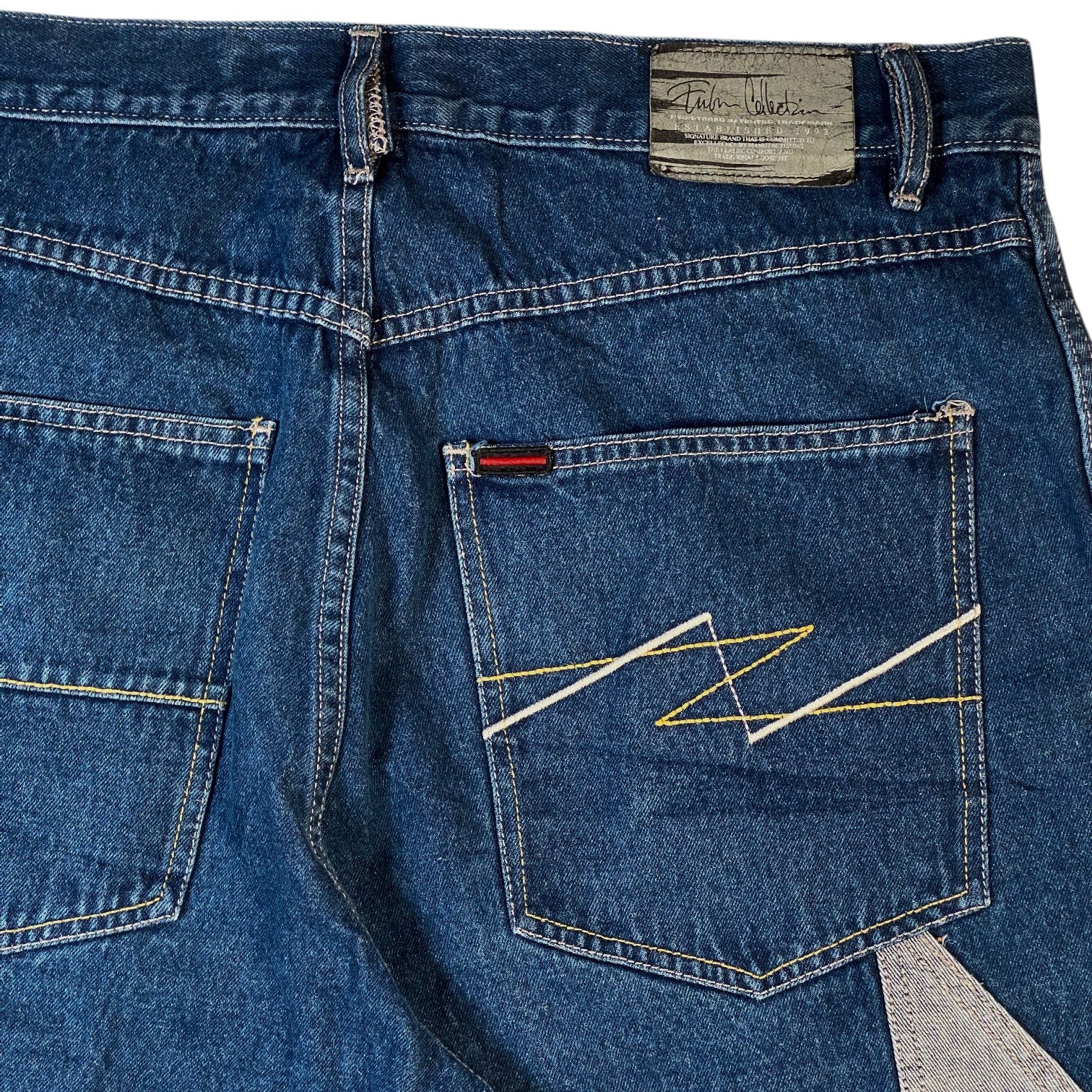 Digg It Thrift & Vintage FUBU The Collection baggy denim carpenter jorts with back pocket embroidery and leather patch