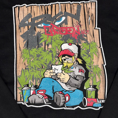 Digg It Thrift & Vintage black pullover hoodie featuring a colorful graffiti art character print with spray cans.