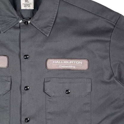Digg It Thrift & Vintage gray short sleeve work shirt with Halliburton Cementing patch and button-down front