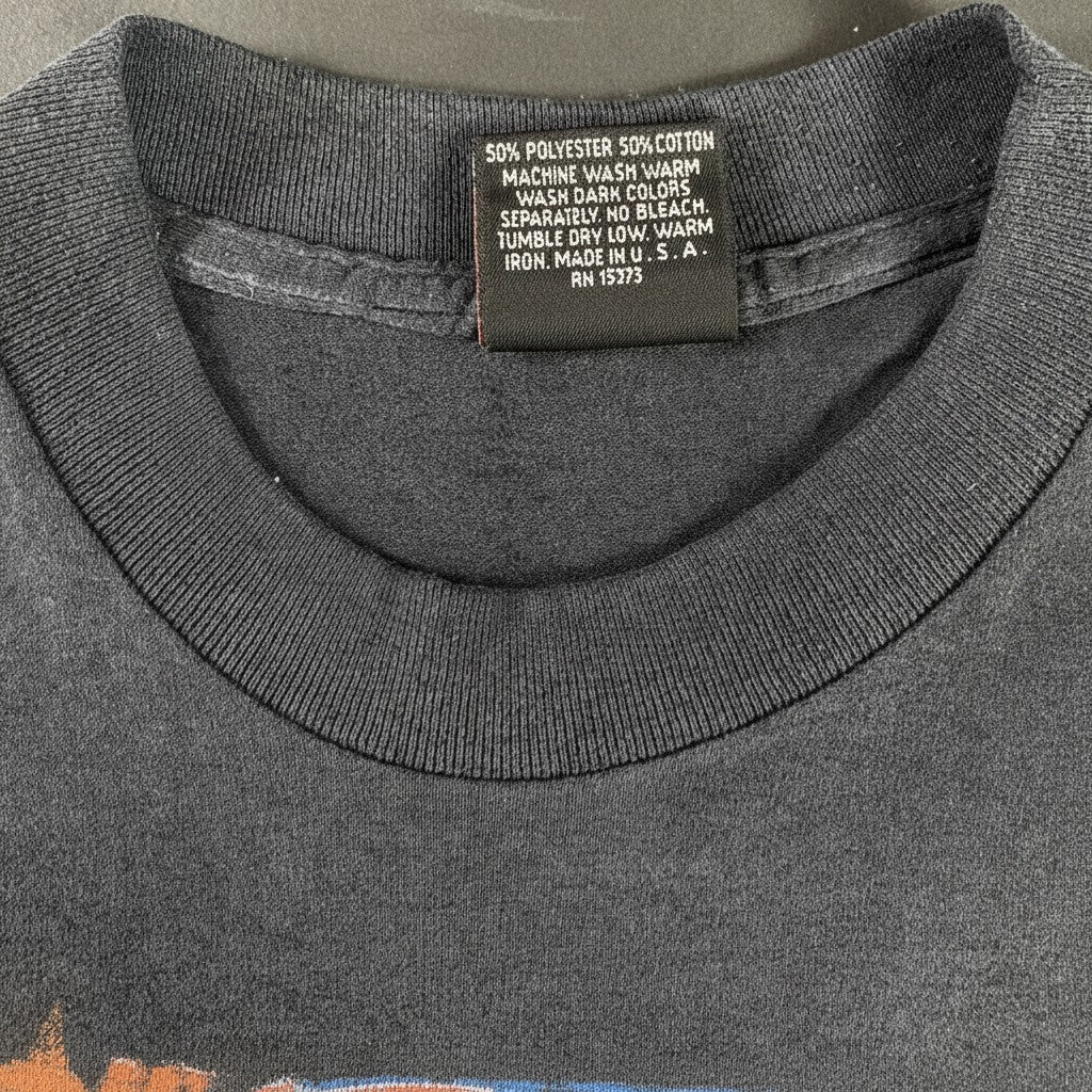 Digg It Thrift & Vintage 1991 Harley Davidson t-shirt care label showing 50/50 cotton polyester blend made in USA