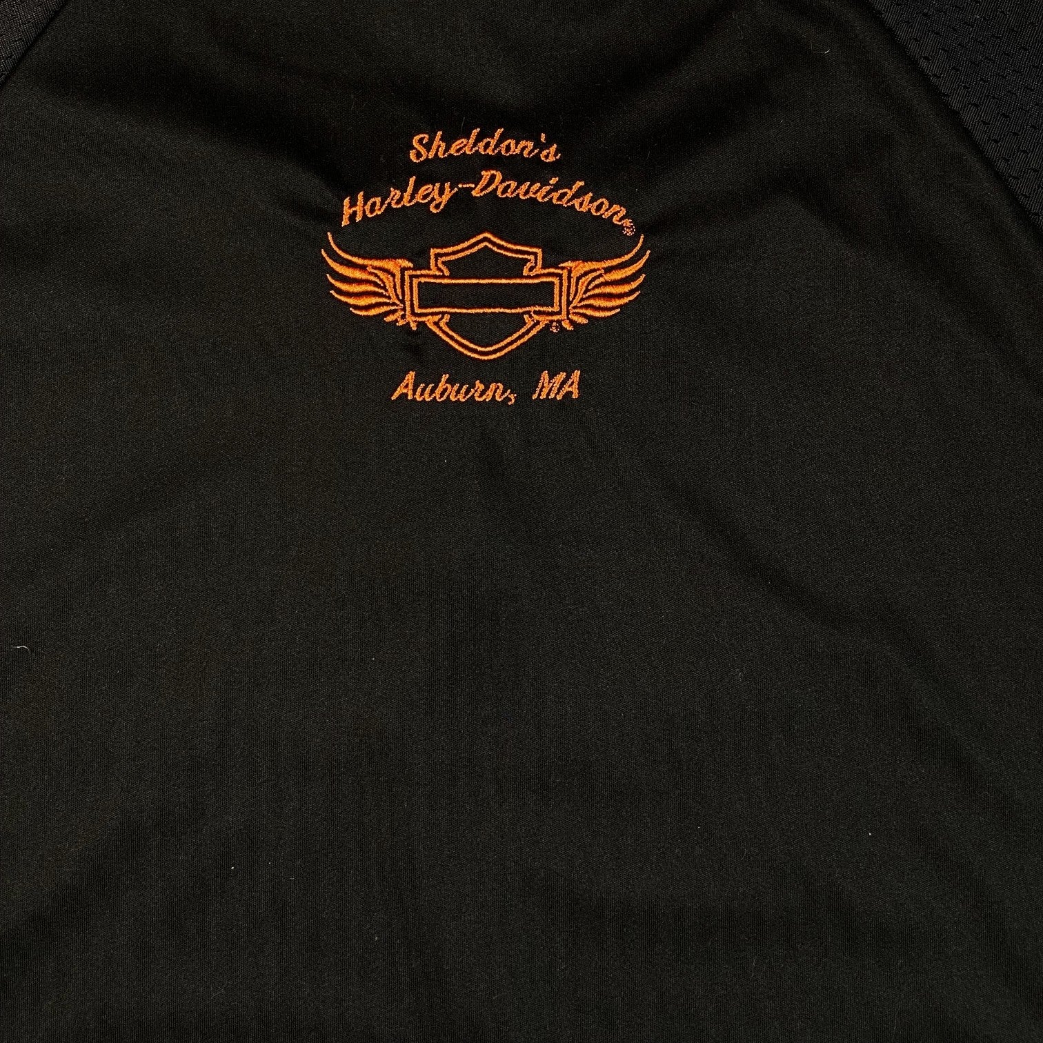 Digg It Thrift & Vintage black Harley-Davidson football jersey with orange embroidered logo and text