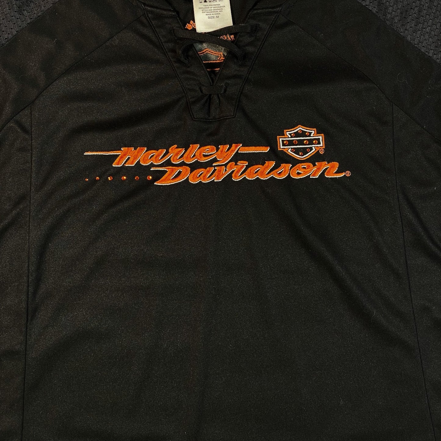 Digg It Thrift & Vintage black Harley-Davidson lace-up football jersey with orange embroidered logo