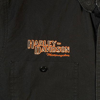 Digg It Thrift & Vintage black short-sleeve mechanic shirt featuring orange Harley-Davidson embroidery on the pocket