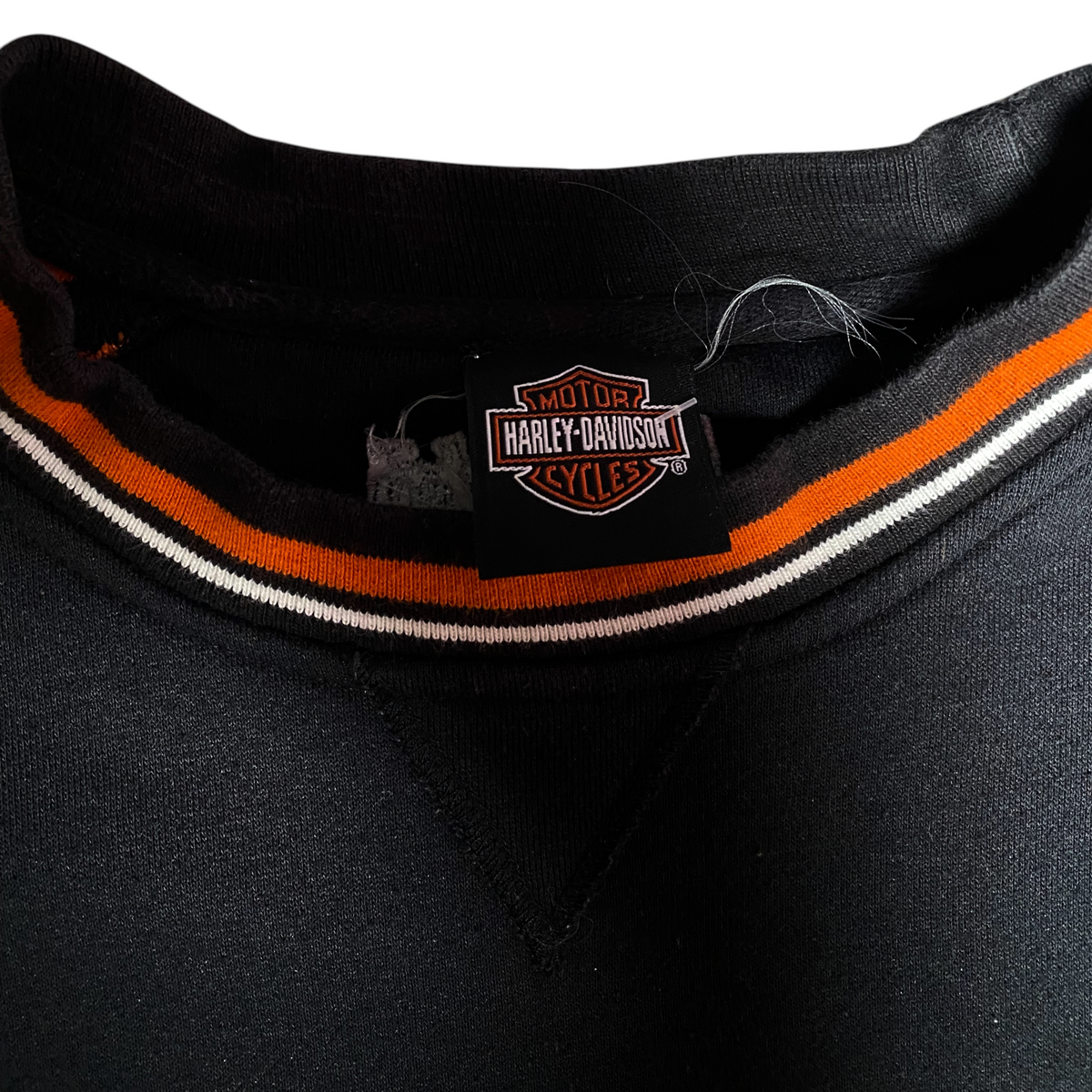 Digg It Thrift & Vintage black Harley-Davidson crewneck sweatshirt with orange and white striped ribbed collar