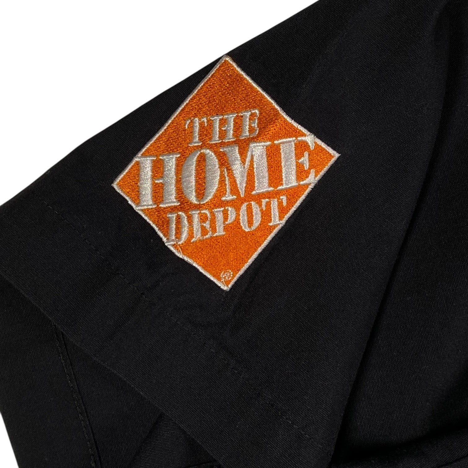 Digg It Thrift & Vintage black short sleeve work shirt featuring an embroidered The Home Depot logo on the sleeve