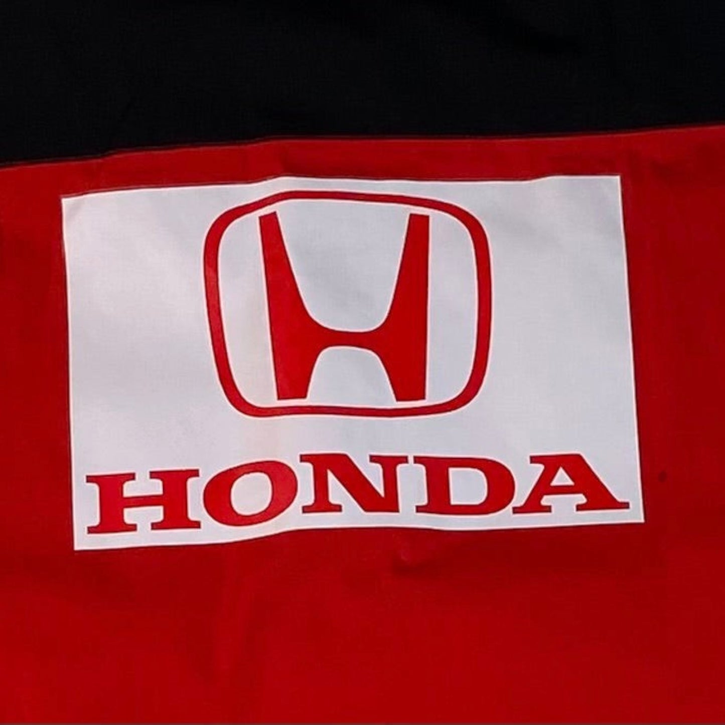 Digg It Thrift & Vintage Honda Racing logo patch on a red and black mechanic work shirt