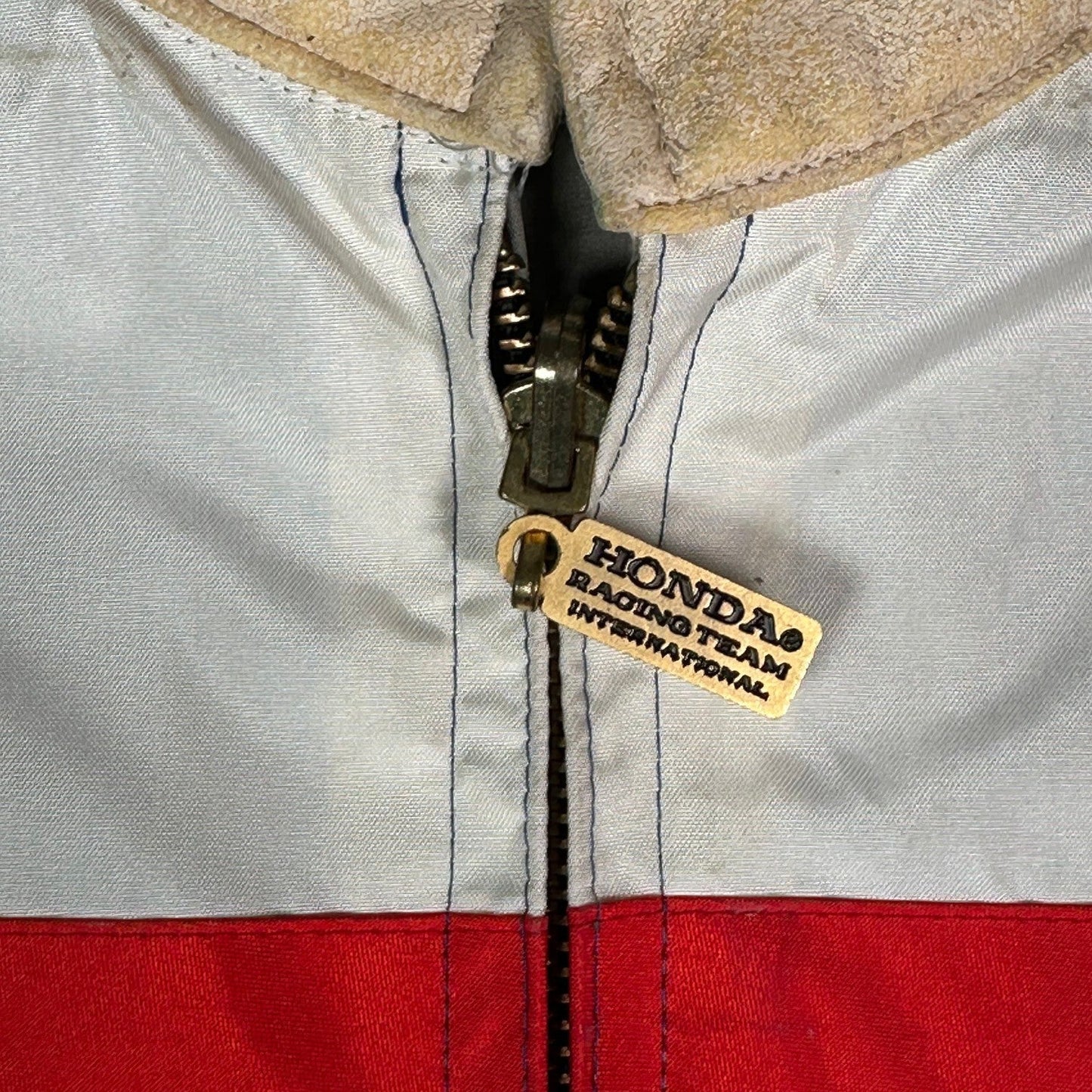 Digg It Thrift & Vintage Honda Racing Team windbreaker jacket featuring a branded gold metal zipper pull