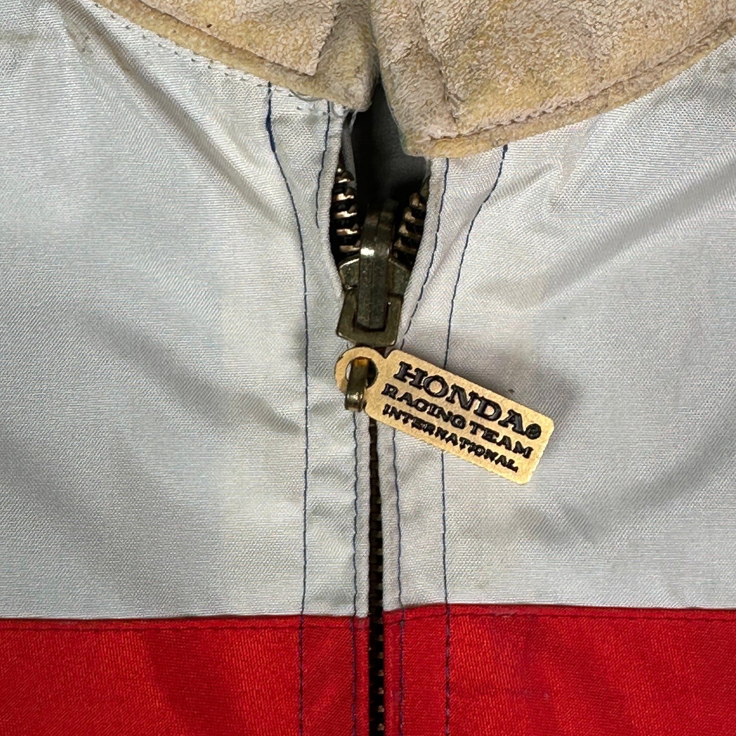 Digg It Thrift & Vintage Honda Racing Team windbreaker jacket featuring a branded gold metal zipper pull
