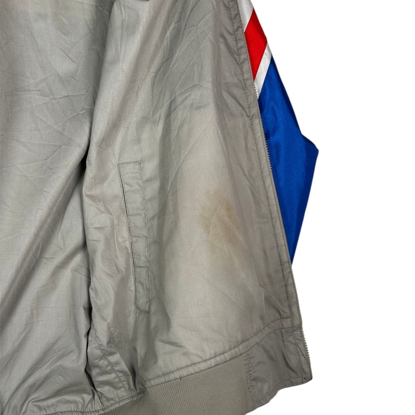 Digg It Thrift & Vintage reversible Honda racing windbreaker showing a light stain on the grey interior fabric.