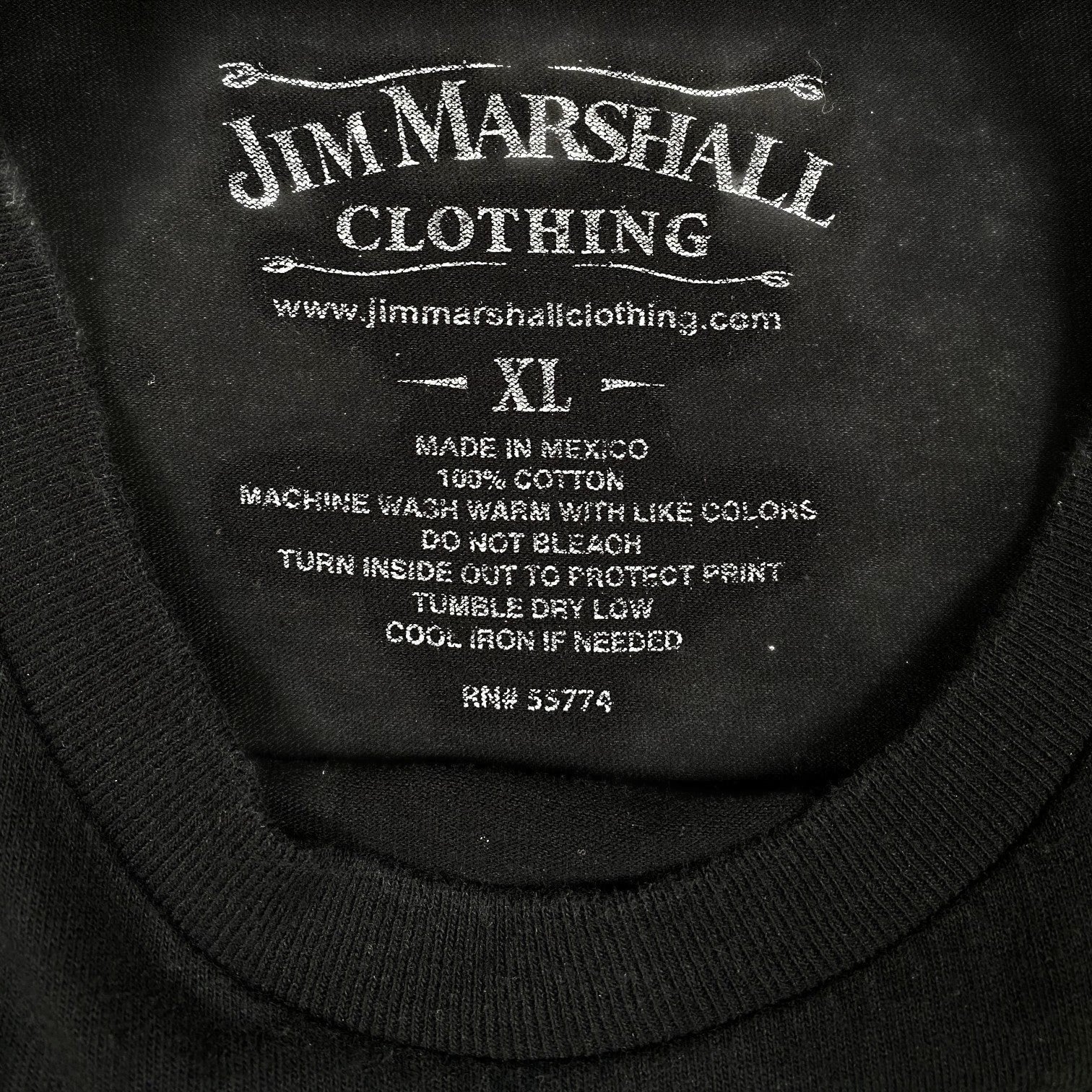 Digg It Thrift & Vintage black cotton t-shirt inner neck label with Jim Marshall Clothing branding and size XL