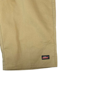 Digg It Thrift & Vintage khaki Dickies shorts with a classic woven logo patch on the hem