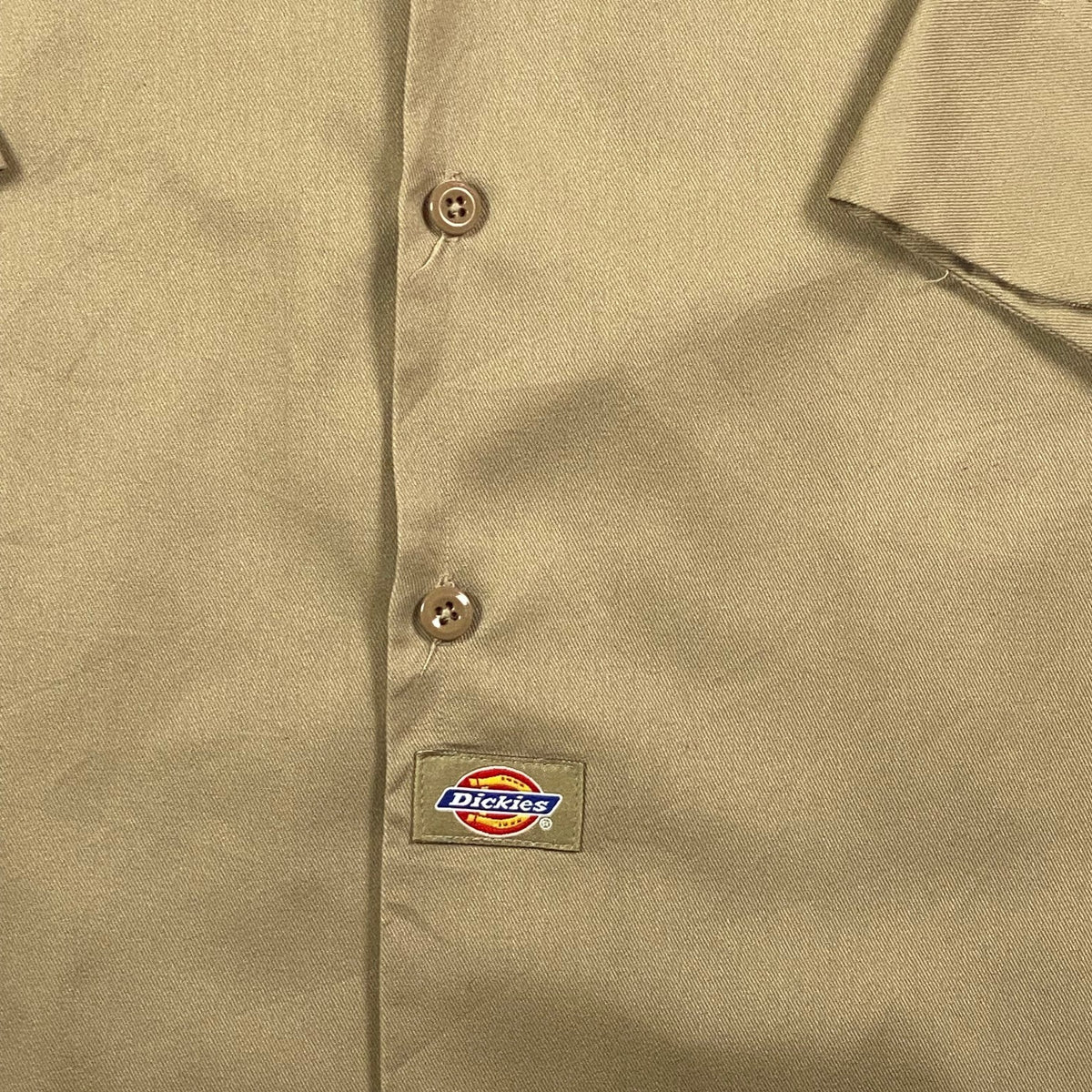 Digg It Thrift & Vintage khaki Dickies long sleeve work shirt with button-down front and classic logo patch
