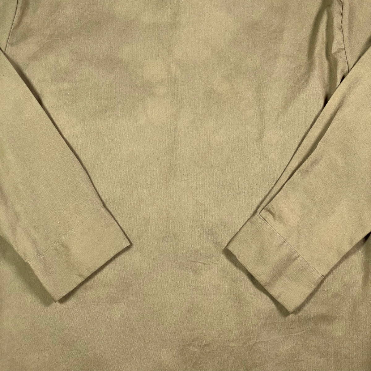 Back view of a Digg It Thrift & Vintage khaki long sleeve work shirt with a classic collar and button cuffs.