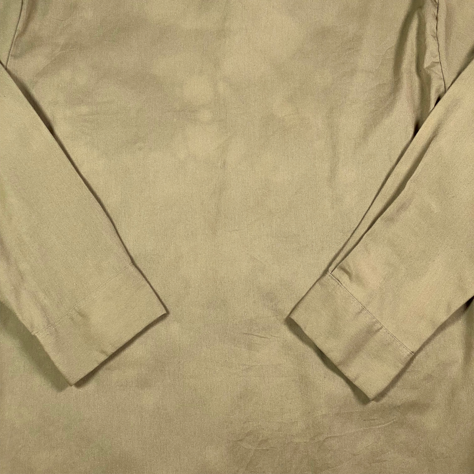 Back view of a Digg It Thrift & Vintage khaki long sleeve work shirt with a classic collar and button cuffs.