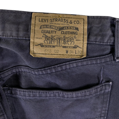 Digg It Thrift & Vintage Levi's 618 faded black denim jeans with iconic leather brand patch on the back waistband.
