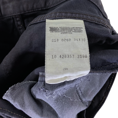 Digg It Thrift & Vintage Levi's 618 faded black jeans interior care label showing Made in UK and size 34x30