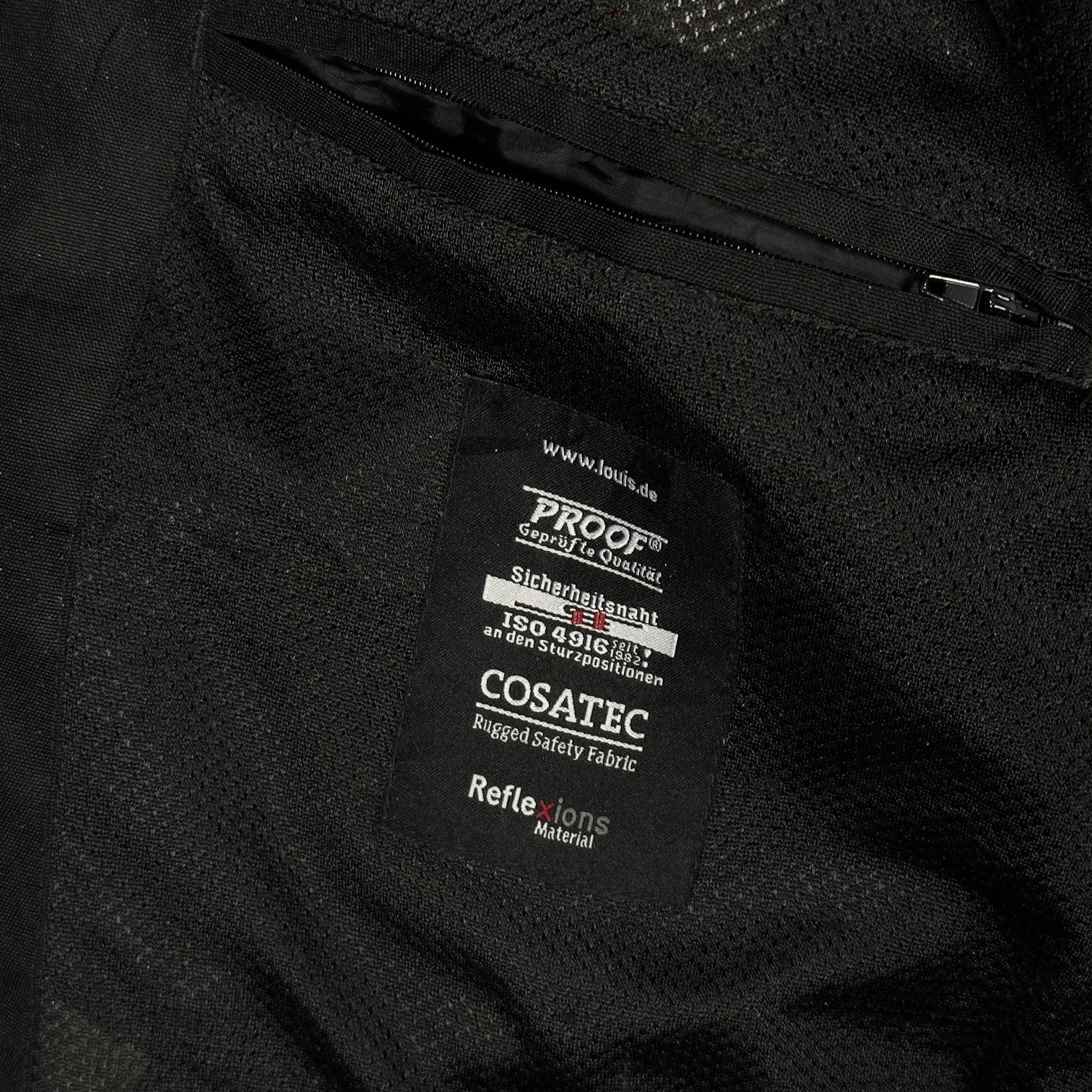 Digg It Thrift & Vintage Louis 75th Anniversary motorcycle jacket interior label with Proof and Cosatec branding