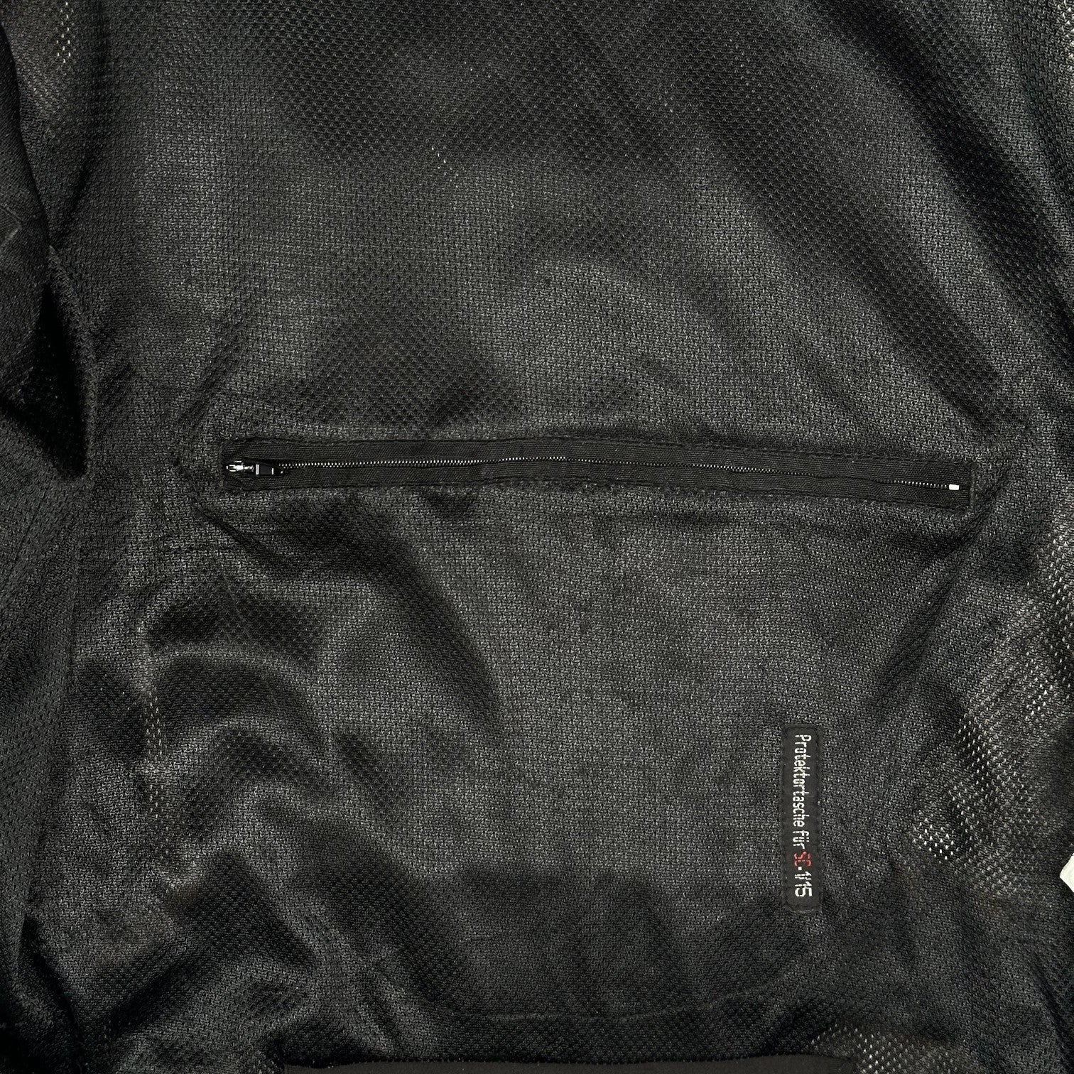 Digg It Thrift & Vintage Louis 75th Anniversary motorcycle racing jacket black mesh interior with zipper pocket