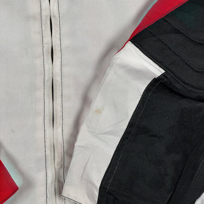 Digg It Thrift & Vintage Louis 75th Anniversary motorcycle racing jacket in white, red, and black textile fabric