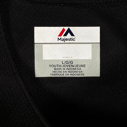 Digg It Thrift & Vintage Majestic Cool Base youth large baseball jersey neck label on black fabric